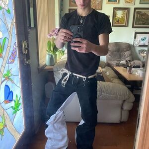 Relaxed Black and White Jeans with Distressed Details